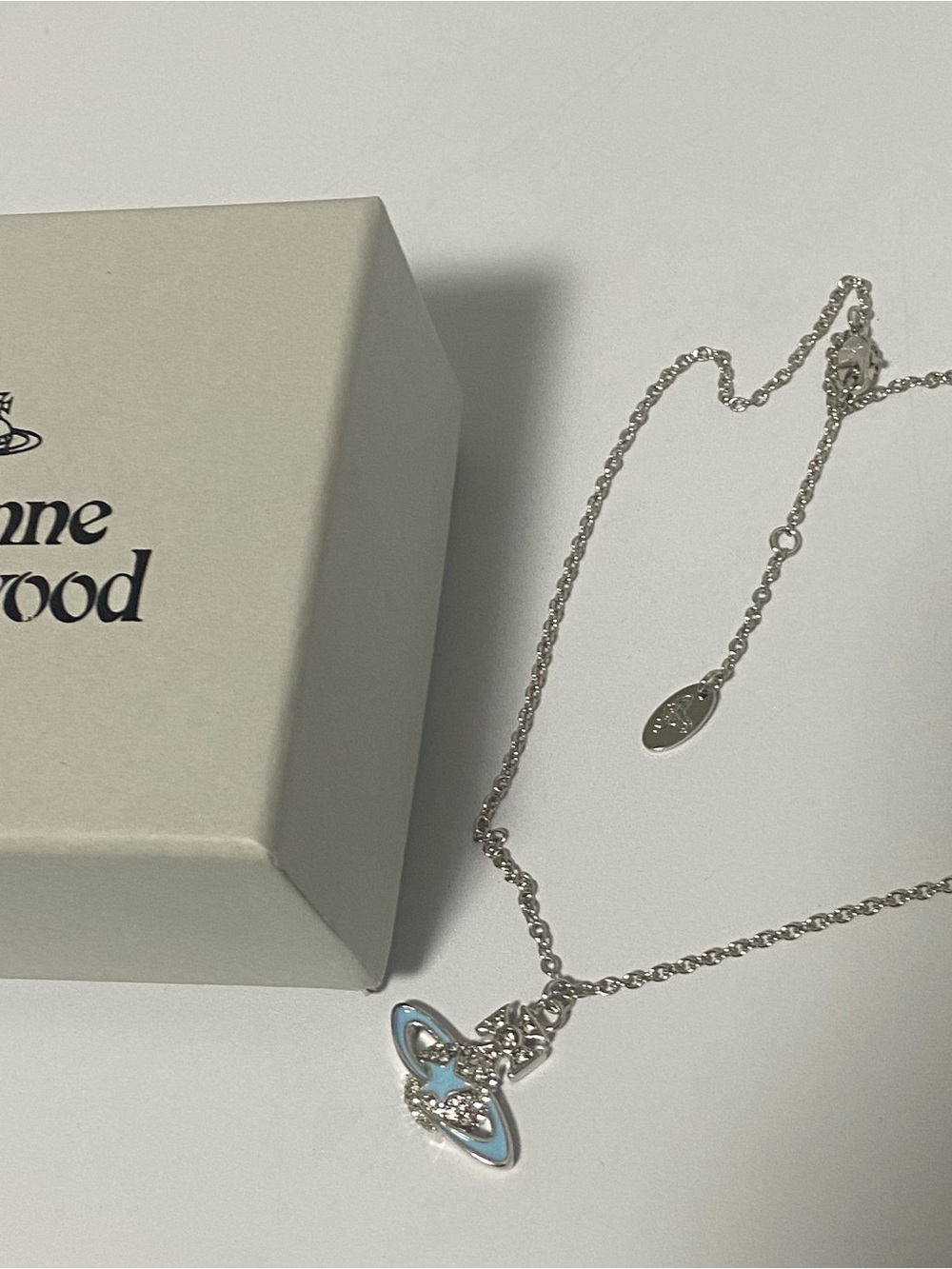 Vivienne Westwood Silver Necklace with Pale Blue Orb Pendant